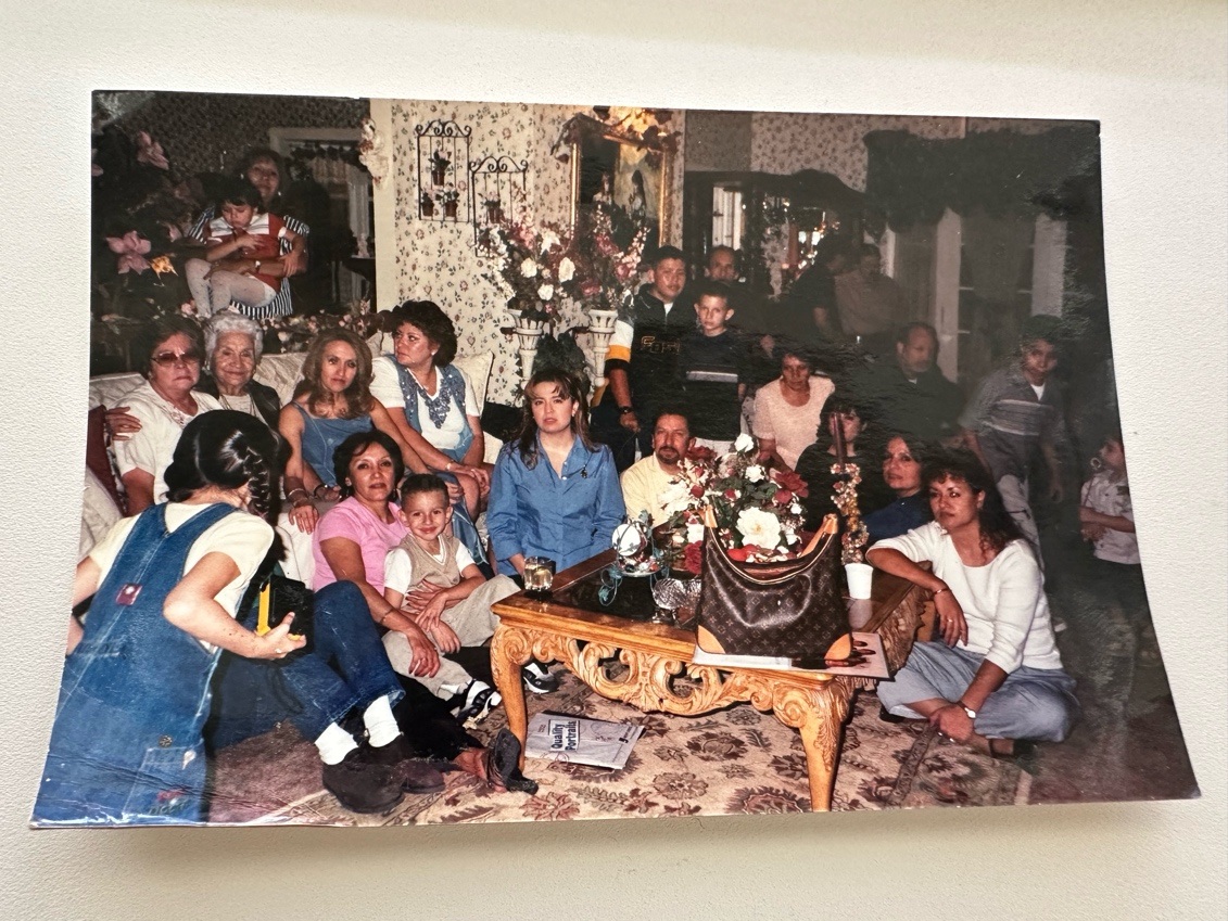 A family gathering around a table